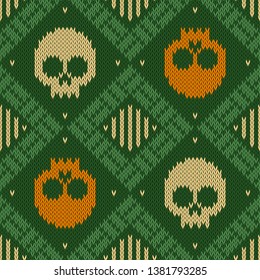 Knitted woolen seamless pattern with skulls in green shades