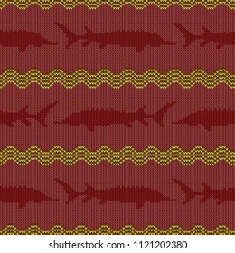 Knitted woolen seamless pattern with sturgeons in vintage burgundy tones