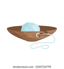 Una pelota de tejer en una canasta. Vector.