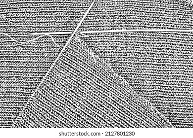 Knitting by hand. Handiwork. Knitted surface. Spokes. Warm handmade knitwear. Warp knitting for winter. Vector illustration. Overlay template.