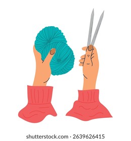 Knitting. Hands hold a knitted fabric on the needles. Hobby, handmade, handicraft.