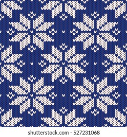 Knitting, seamless vector background, snowflakes.