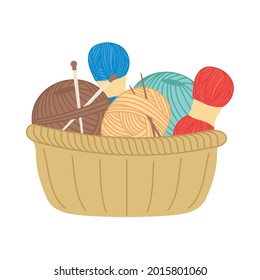 Knitting thread and yarns in basket on white background