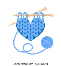 Knitting wool heart with needles