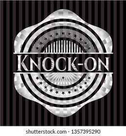 Knock-on silver emblem