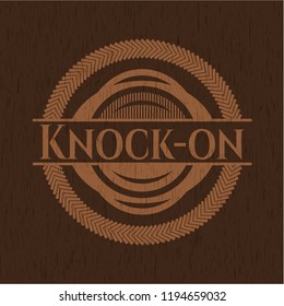 Knock-on wooden emblem