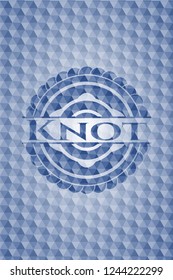 Knot blue badge with geometric pattern background.