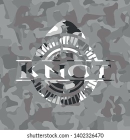 Knot on grey camo texture