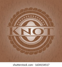 Knot vintage wooden emblem. Vector Illustration.