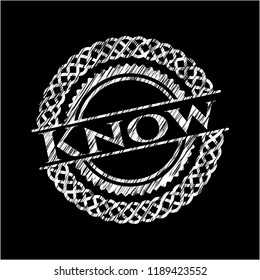 Know chalkboard emblem written on a blackboard