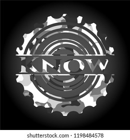 Know written on a grey camouflage texture
