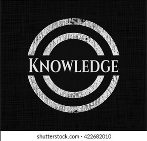 Knowledge chalkboard emblem on black board