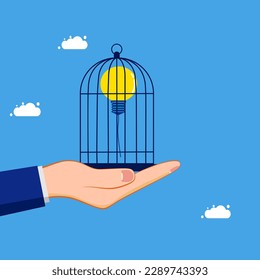 Wissenssteuerung. Die Glühbirne steckt im Vogelkäfig fest. Bildungskonzept