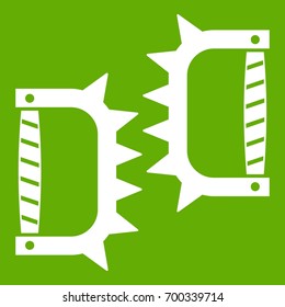 Knuckles with spikes icon white isolated on green background. Vector illustration
