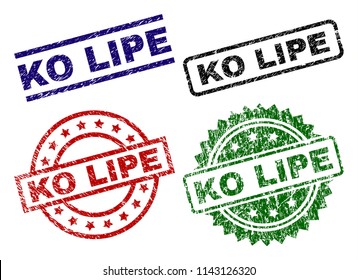 KO LIPE seal prints with damaged surface. Black, green,red,blue vector rubber prints of KO LIPE title with corroded surface. Rubber seals with round, rectangle, medallion shapes.