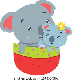 The koala with her baby is coming out from the red pocket of illustration