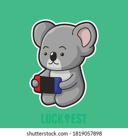 Koala está jugando consola de juegos estilo caricatura plana icono de ilustración de icono para muchos fines.