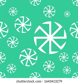 
Kolovrat seamless white pattern, Slavic symbol of the sun. Green background.