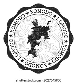 Komodo outdoor stamp. Round sticker with map of island with topographic isolines. Vector illustration. Can be used as insignia, logotype, label, sticker or badge of the Komodo.