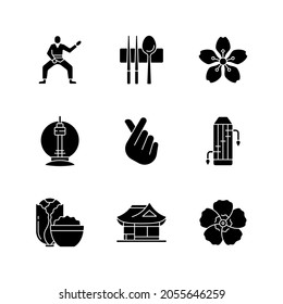 Korean culture black glyph icons set on white space. Taekwondo fighter. Sujeo utensils. Cherry blossom. N Seoul tower. Finger heart. Gayageum, kimchi. Silhouette symbols. Vector isolated illustration