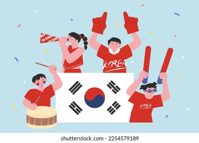 Korean football cheering team Red Devils. With the Taegeukgi in the center, people are cheering with cheering tools around.