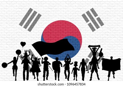Korean supporter silhouette in front of brick wall with South Korea flag. All the objects, silhouettes and the brick wall are in different layers. 