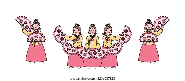 Korean traditional dance. Dancers wearing hanbok perform a beautiful fan dance.