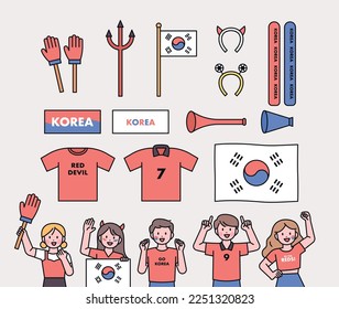 Korea's soccer cheering team Red Devils supporters. Supporting items and fans cheering.