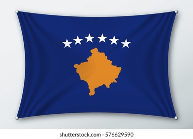 Kosovo national flag. Symbol of the country on a stretched fabric with waves attached with pins. Realistic vector illustration.