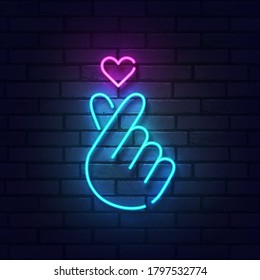 K-POP neon sign. Sign of Finger Heart with colorful neon lights isolated on brick wall. Vector illustration