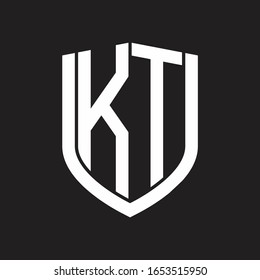 KT Logo monogram with emblem shield design isolated on black background