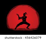 Kung fu action designed on sunset background graphic vector.