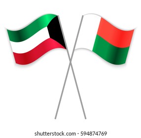 Kuwaiti and Malagasy crossed flags. Kuwait combined with Madagascar isolated on white. Language learning, international business or travel concept.