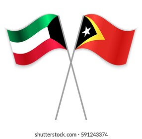 Kuwaiti and Timorese crossed flags. Kuwait combined with East Timor isolated on white. Language learning, international business or travel concept.