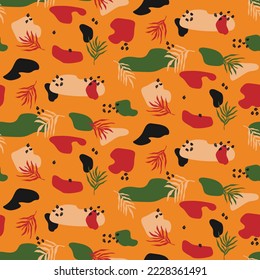 Kwanzaa abstract bright colorful seamless pattern background design with random organic shapes, palm leaves. Vector backdrop, abstract wallpaper for for Kwanzaa African American Celebration in USA.