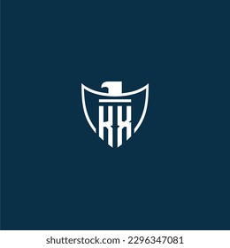 KX initial monogram logo for shield with eagle image vector design