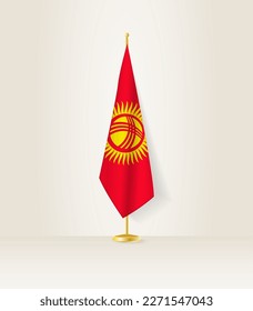 Kyrgyzstan flag on a flag stand. Vector illustration.