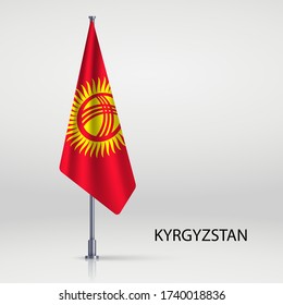 Kyrgyzstan hanging flag on flagpole