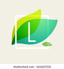 L letter logo in square frame at green leaves watercolor background. Vector ecology typeface for botanical labels, floral headlines, recycle posters, organic cards etc.