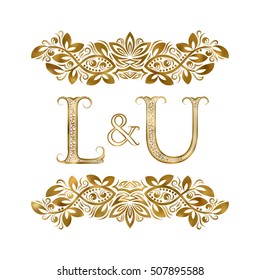 L and U vintage initials logo symbol. The letters are surrounded by ornamental elements. Wedding or business partners monogram in royal style.