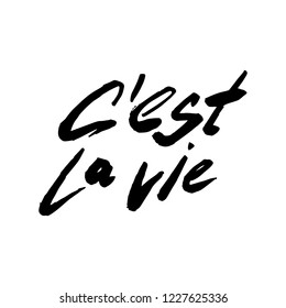 C’est la vie. French lifestyle quote. Such is life. Vector handwritten lettering. Hand drawn black and white brush phrase for any design.