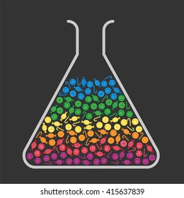 Lab flask filled with colorful candies
