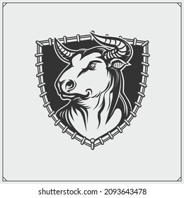 Label with aggressive bull. Corrida emblem. Vector illustration. Print design for t-shirt.