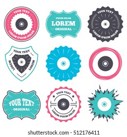 Label and badge templates. CD or DVD sign icon. Compact disc symbol. Retro style banners, emblems. Vector