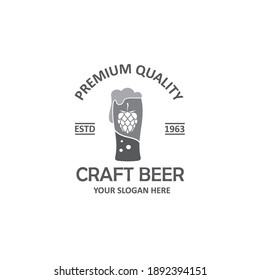 label of beer glass and hops isolated on white background
