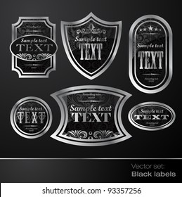 The label is black with silver. For packages of wine and other products.
