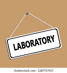 Label with a chain hanging on the screw and the inscription Laboratory