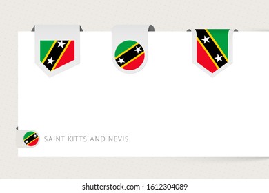 Label flag collection of Saint Kitts and Nevis in different shape. Ribbon flag template of Saint Kitts and Nevis hanging from paper or different surface.