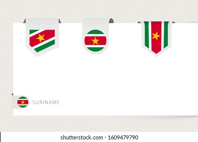 Label flag collection of Suriname in different shape. Ribbon flag template of Suriname hanging from paper or different surface.