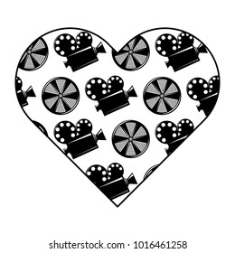 label heart with movie camera projector and reel film